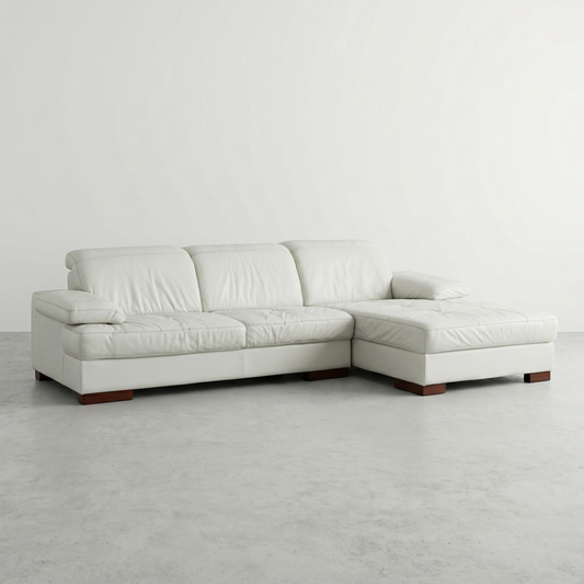 Cream leather sectional sofa with adjustable headrests and armrests